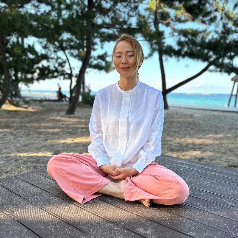 Heartmoon Haejung Ocean meditating in harmony by the sea