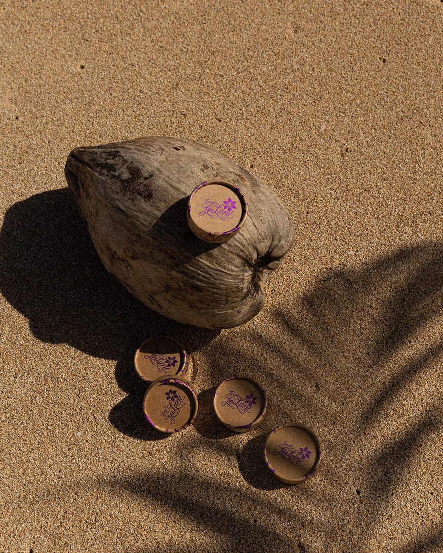 Sweet LeiLani recycled packaging on the beach